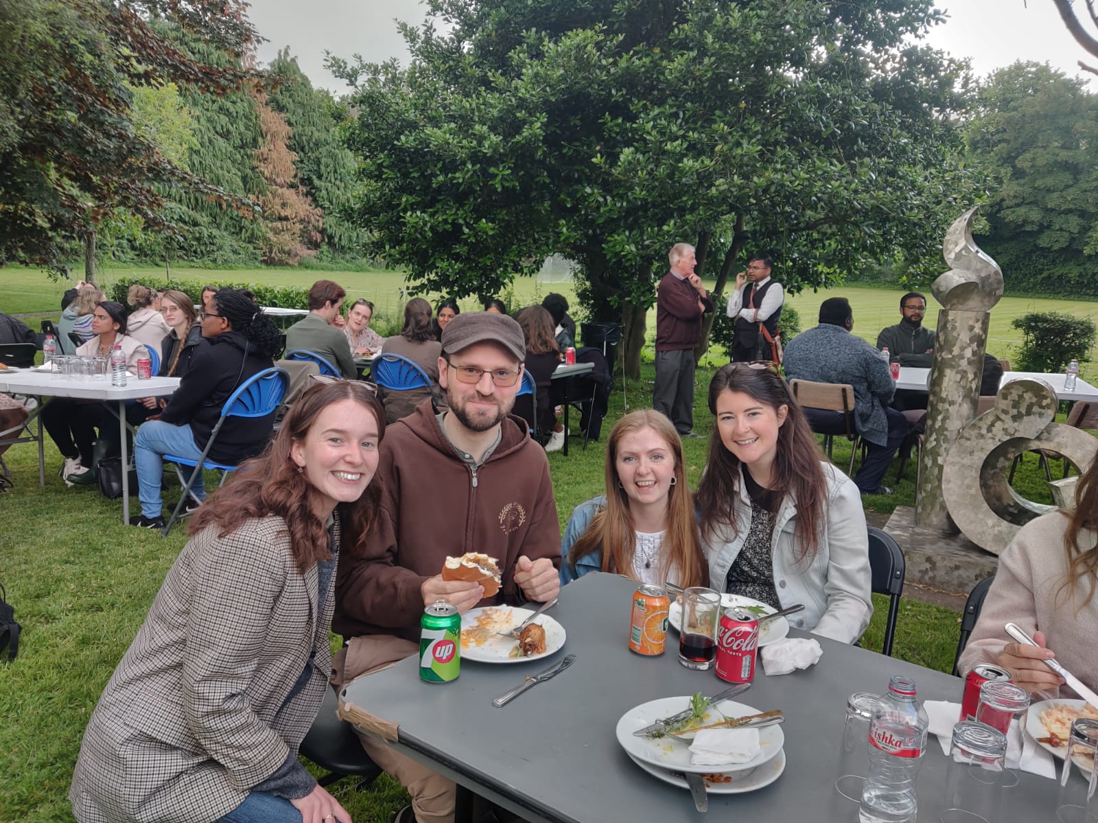 Miriam (L.E.A.F. Director) with young adults attending a BBQ