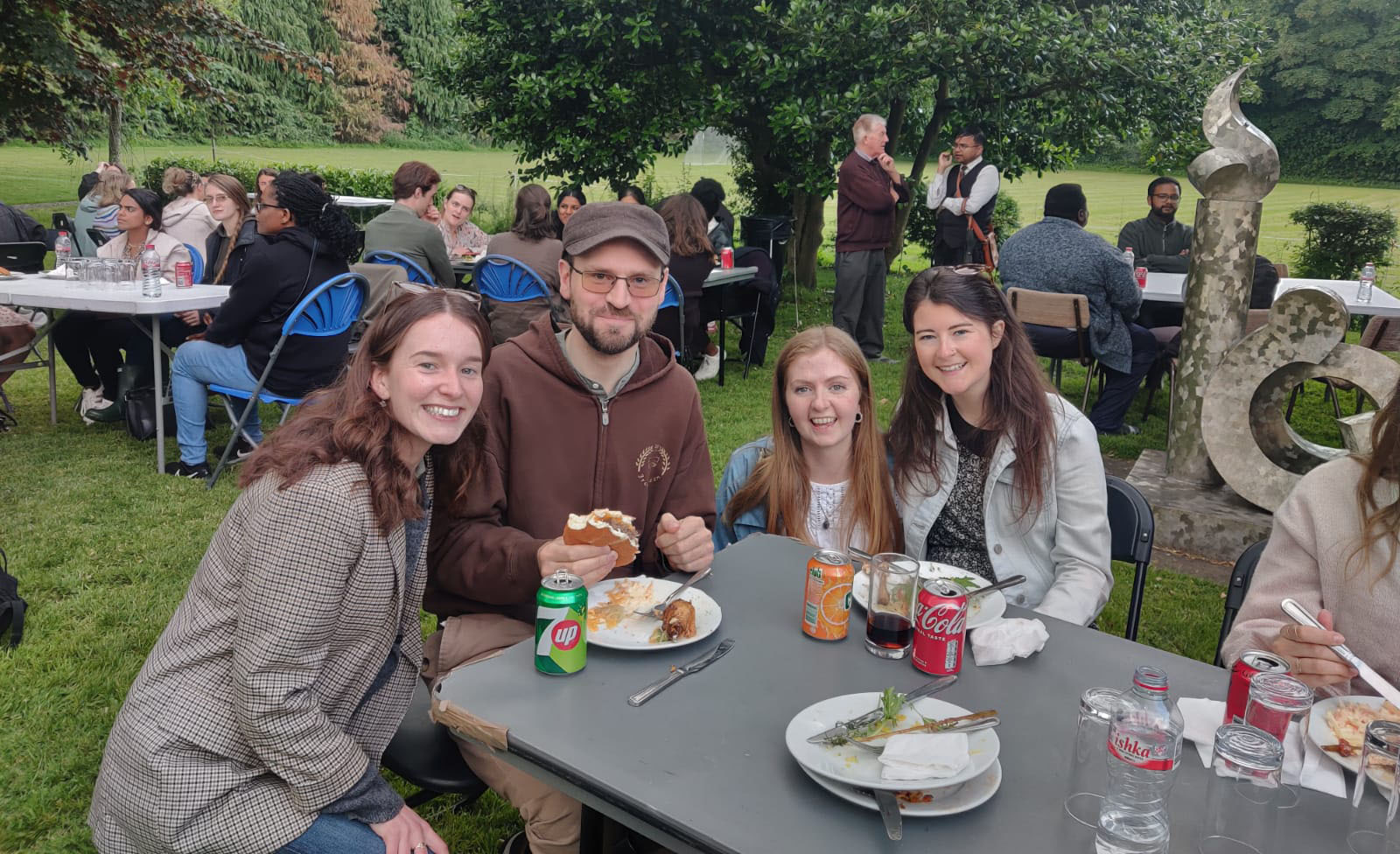 Miriam (L.E.A.F. Director) with young adults attending a BBQ